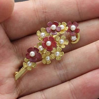 18K gold florets brooch with red copper and diamond