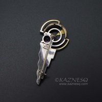 Art Deco style 18K gold and silver combi brooch with a amethyst
