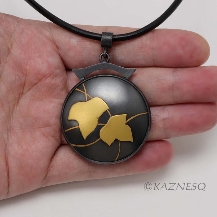 (C) KAZNESQ: Ivy Keum Boo circle pendant of oxidized silver