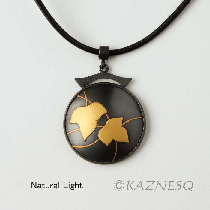 (C) KAZNESQ: Ivy Keum Boo circle pendant of oxidized silver