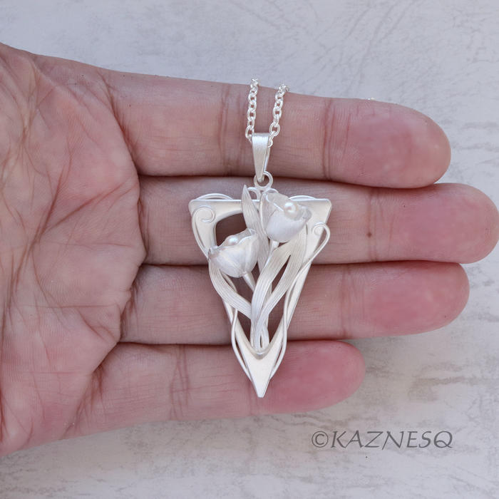(C) KAZNESQ: Art Nouveau style Floral triangle silver pendant with Akoya Pearls.