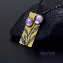 (C) KAZNESQ: Amethyst lined with Mother of Pearl Rectangle Gold tone Oxidized Si