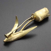 Tulip brooch featuring a diamond