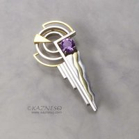 Art Deco style 18K gold and silver combi brooch with a amethyst