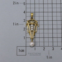 Art Deco style 18K gold, diamond, cultured pearl pendant head of arch motif