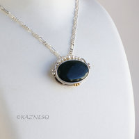 (C) KAZNESQ: Velvet obsidian oval silver pendant with pearls