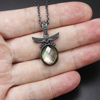 Sold: Silver pendant of quartz backed up by black pearl oyster