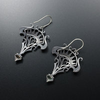 Oxidizes silver arch and scrolls earrings