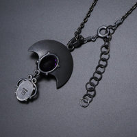 Openwork arch pendant, oxidized silver and gold leaf, amethyst and opal necklace