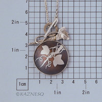 (C) KAZNESQ: Wild grape Keum Boo copper and silver necklace.
