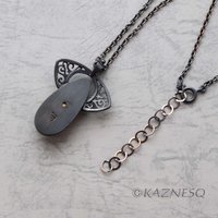 (C)KAZNESQ: Black tourmaline quartz lined with gold oxidized silver necklace
