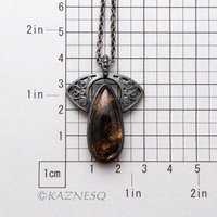 (C)KAZNESQ: Black tourmaline quartz lined with gold oxidized silver necklace