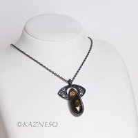 (C)KAZNESQ: Black tourmaline quartz lined with gold oxidized silver necklace
