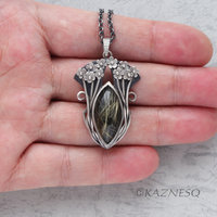 (C) KAZNESQ: Rutilated quartz lined with onyx, Art Nouveau style necklace