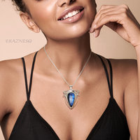 (C) KAZNESQ: Blue labradorite Art Nouveau style silver pendant necklace.