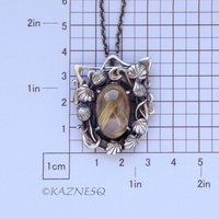 (C) KAZNESQ: Rutilated Quartz with Mother of Pearl Oxidized Silver decorated Fra