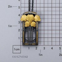 (C) KAZNESQ: Art Deco Style Leaf Motif Oxidized Silver Pendant Necklace with Keu