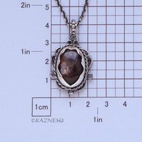 (C) KAZNESQ: Iolite Sunstone oxidized silver filigree and scrolls pendant neckla