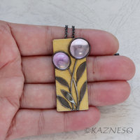 (C) KAZNESQ: Amethyst lined with Mother of Pearl Rectangle Gold tone Oxidized Si
