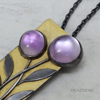(C) KAZNESQ: Amethyst lined with Mother of Pearl Rectangle Gold tone Oxidized Si