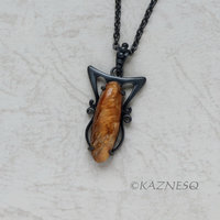 (C) KAZNESQ: Art Nouveau style Long Oval Rutilated Quartz oxidized silver pendan