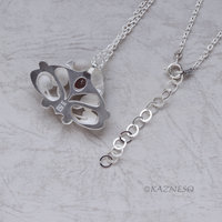(C) KAZNESQ: Art Nouveau style matte finished silver floral pendant necklace wit