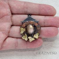 (C) KAZNESQ: Rutilated quartz and Mother of pearl round copper clock, brass leav