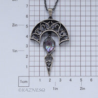 Art Nouveau style Arch pendant necklace with amethyst lined with Paua shell