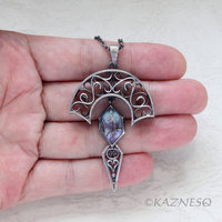 Art Nouveau style Arch pendant necklace with amethyst lined with Paua shell