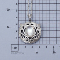 Art Nouveau style matte finished Silver and Quartz lined with Mother Of Pearl Pendant Necklace