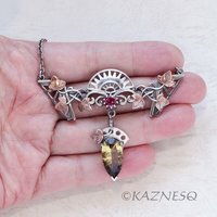 Motif? Who Cares! It's Beautiful! Silver and Copper Ivy-Covered Pendant with Smoky Citrine and Rhodolite Garnet"