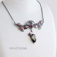 Motif? Who Cares! It's Beautiful! Silver and Copper Ivy-Covered Pendant with Smoky Citrine and Rhodolite Garnet"