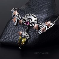 Motif? Who Cares! It's Beautiful! Silver and Copper Ivy-Covered Pendant with Smoky Citrine and Rhodolite Garnet"