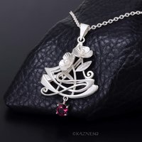 Elegant Statement! Art Nouveau-Style Matte Silver Flower Pendant with Rhodolite Garnet