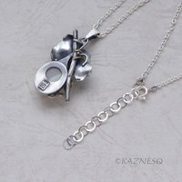 Mystical Brilliance! Silver Leaf Pendant with Rutilated Quartz Backed by Mother of Pearl