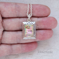 Alluring iridescence! : Rutilated Quartz with Paua Shell Rectangle Silver Pendant