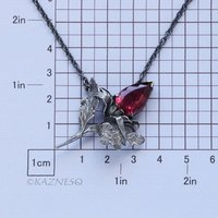 Jewelry That Speaks for You: Handmade Thistle Rubellite Set in Sterling Silver, Gothic Botanical Statement Pieces