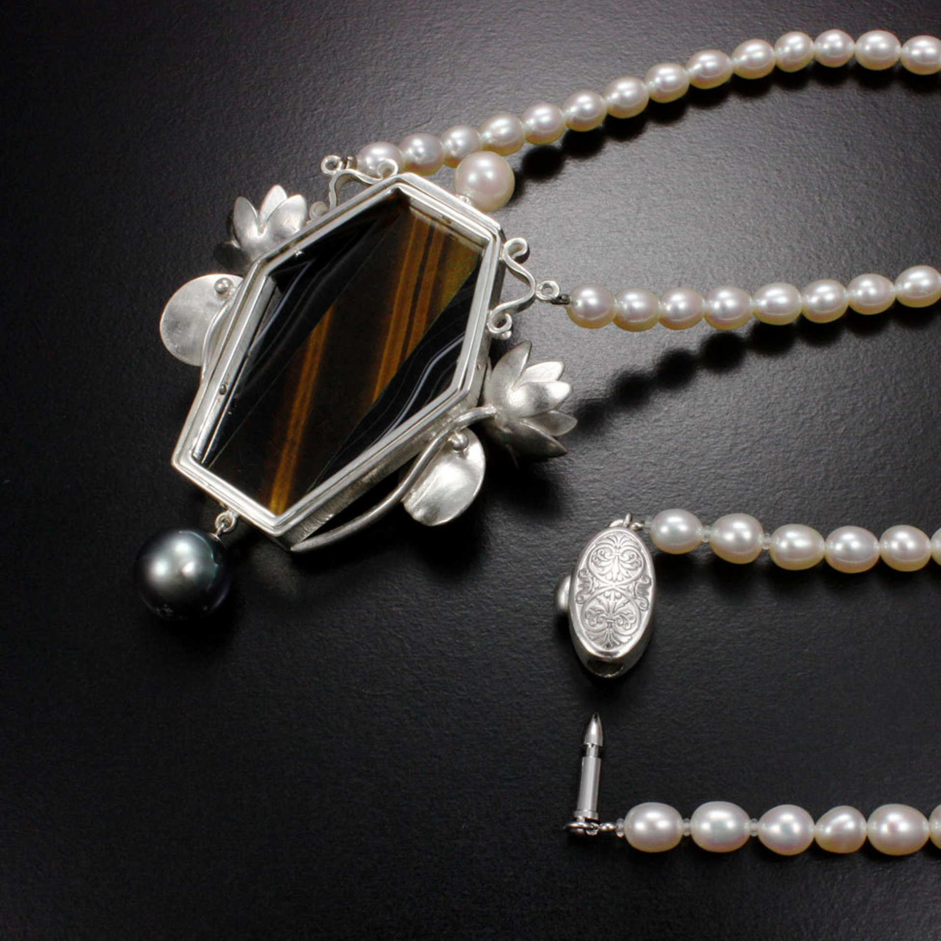 Lotus open work tiger's eye necklace