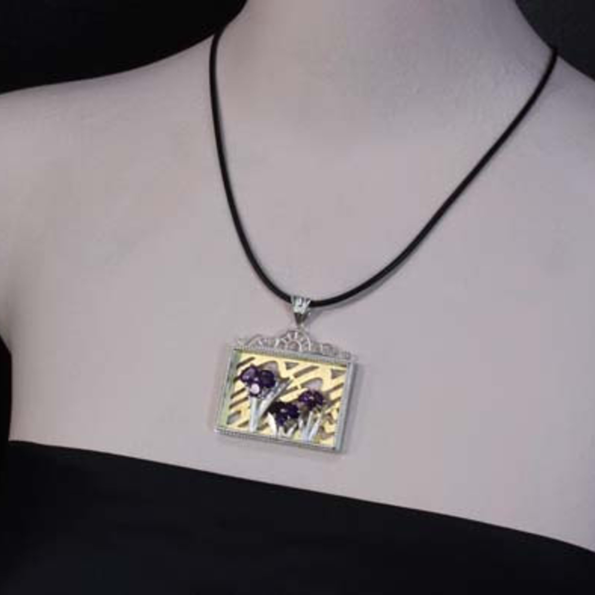 (C) KAZNESQ: Iris pendant featuring amethyst