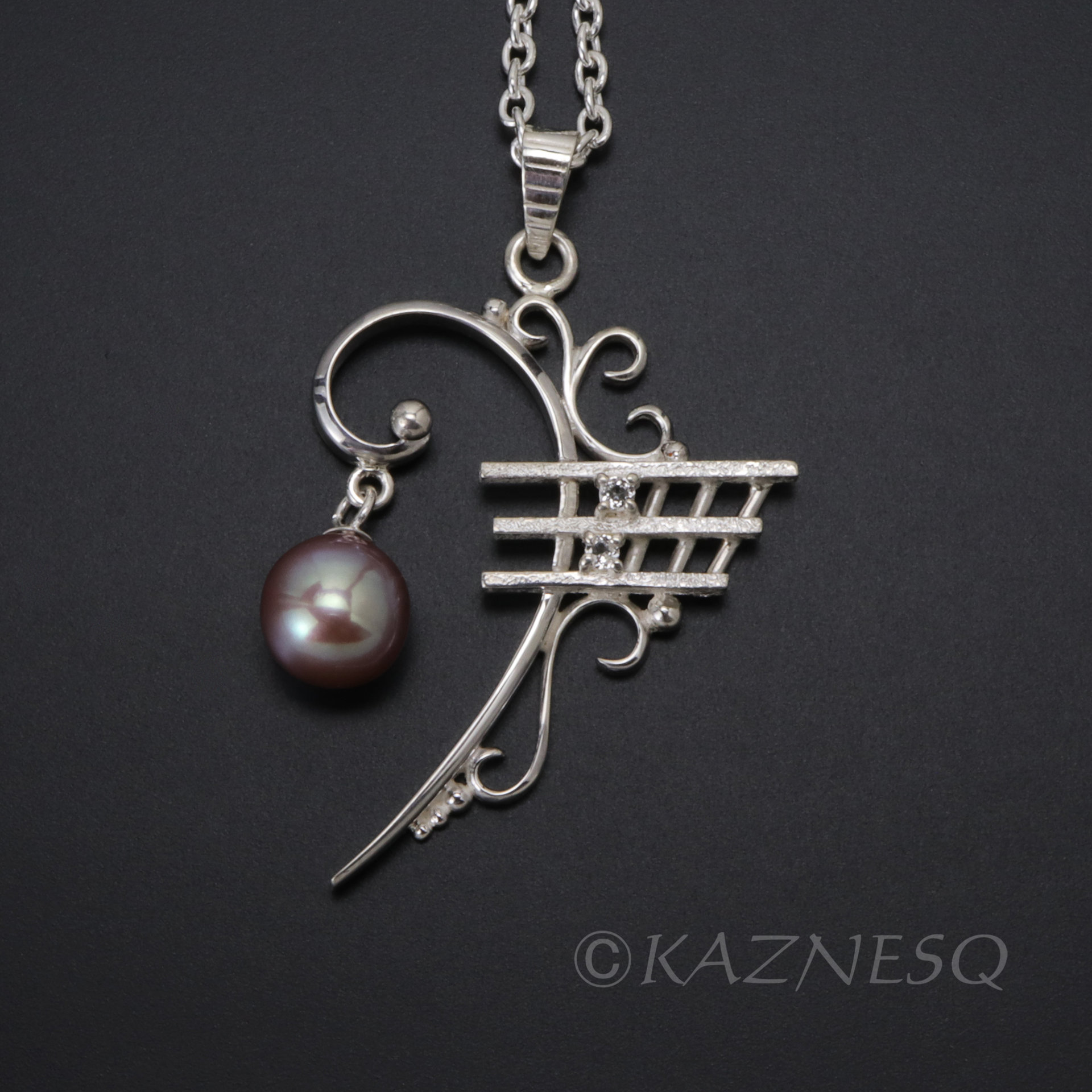 This is a custom order for a specific customer : F clef silver pendant