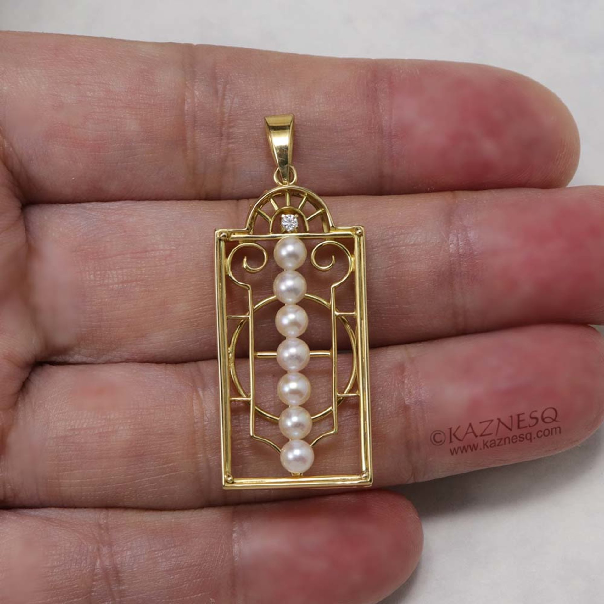 Art Deco style rectangle akoya pearl and a diamond pendant head