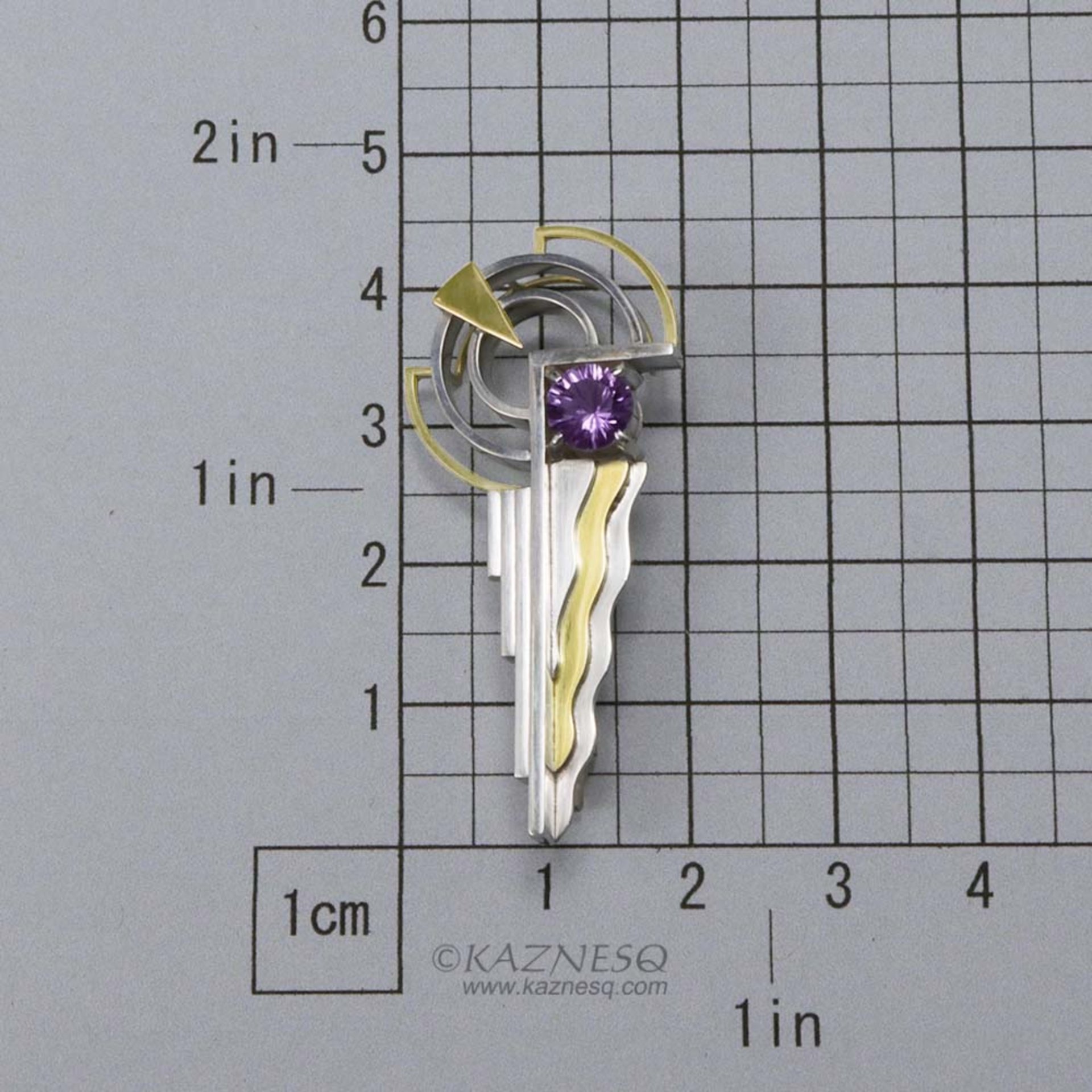 Art Deco style 18K gold and silver combi brooch with a amethyst