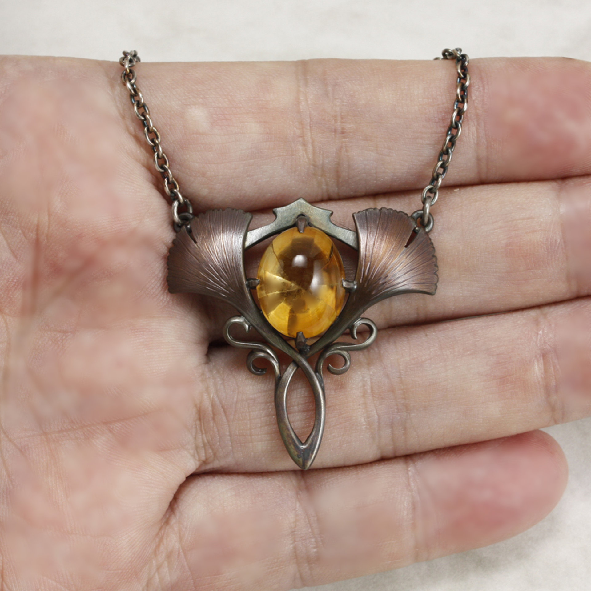 Two ginkgo leaf oxidized silver Art Nouveau necklace with a citrine