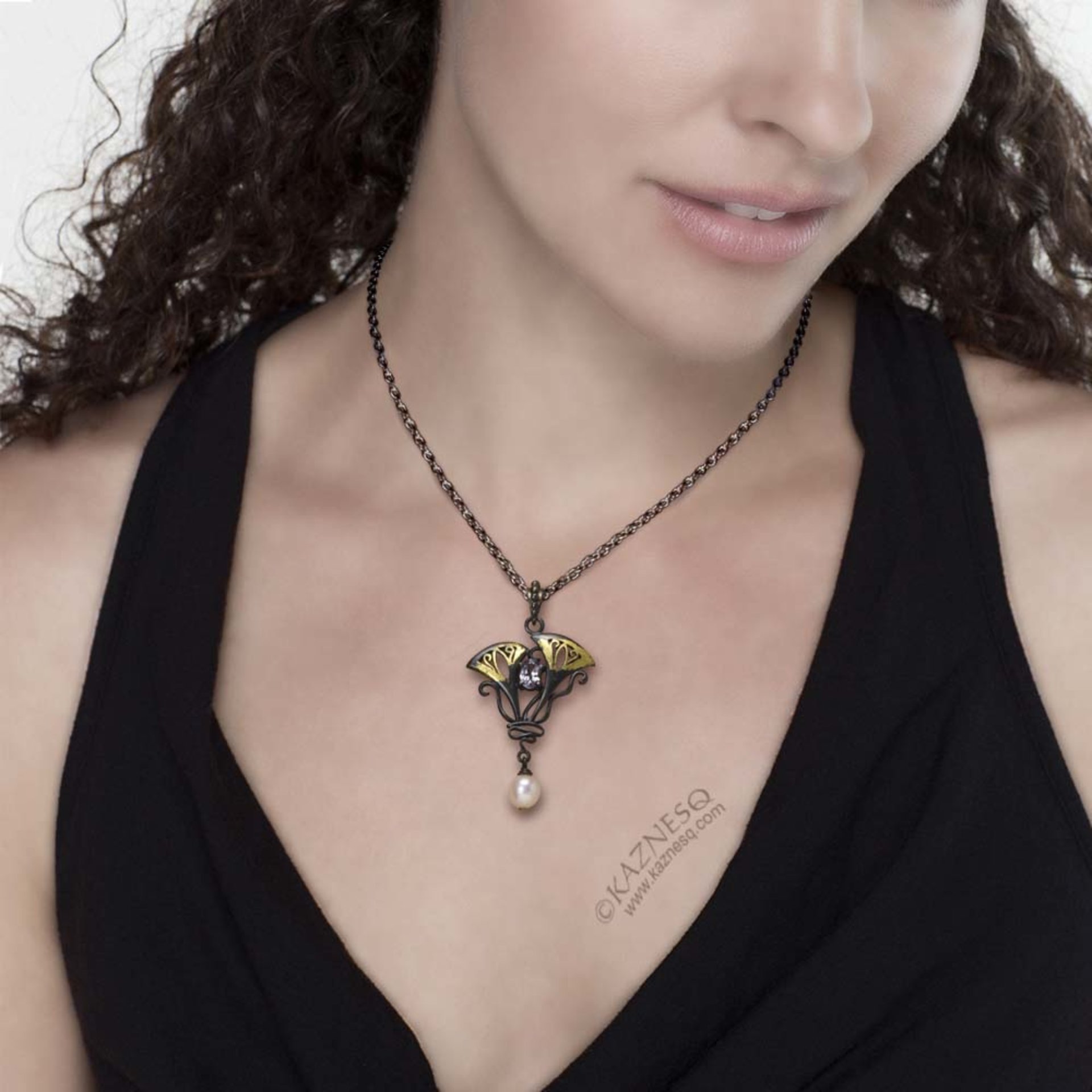 Lavender spinel Art Nouveau style oxidized silver pendant with a freshwater pear