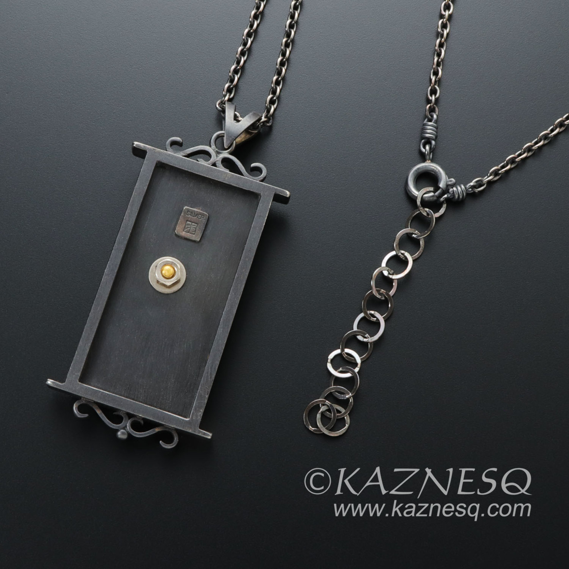 (C) KAZNESQ: Camellia pendant necklace of heat patinaed copper and silver