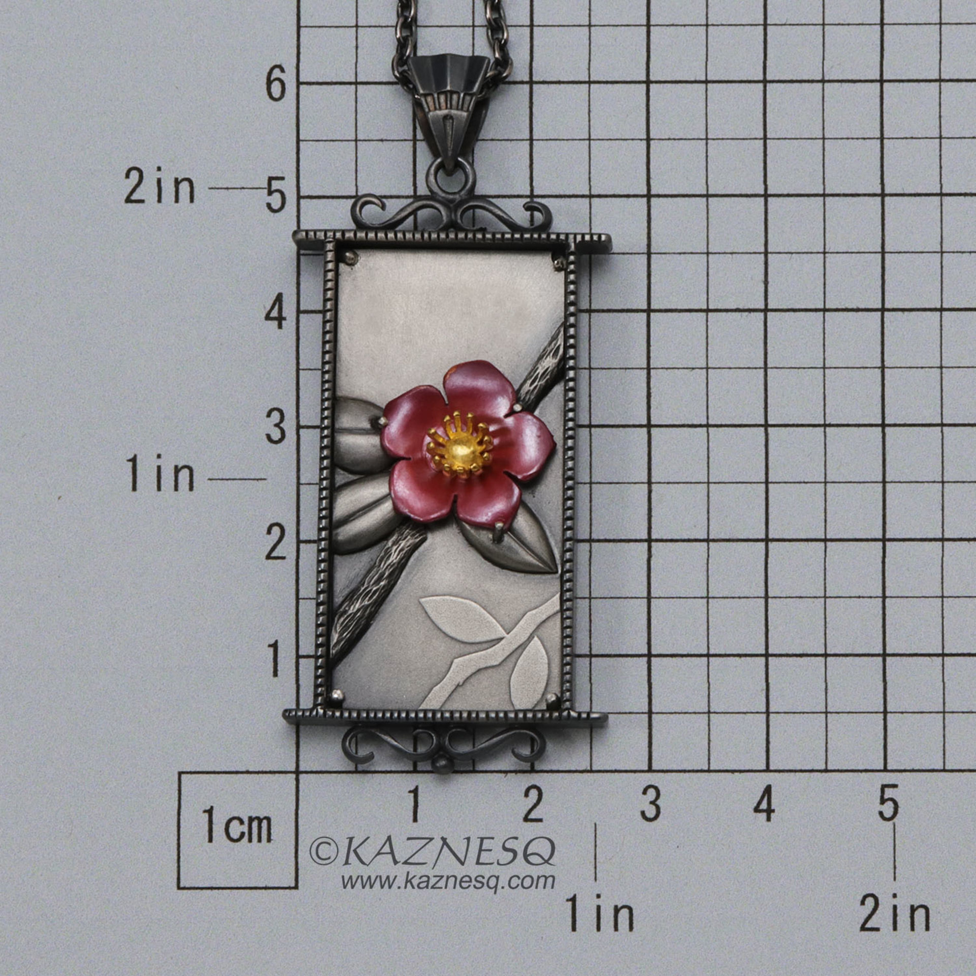 (C) KAZNESQ: Camellia pendant necklace of heat patinaed copper and silver