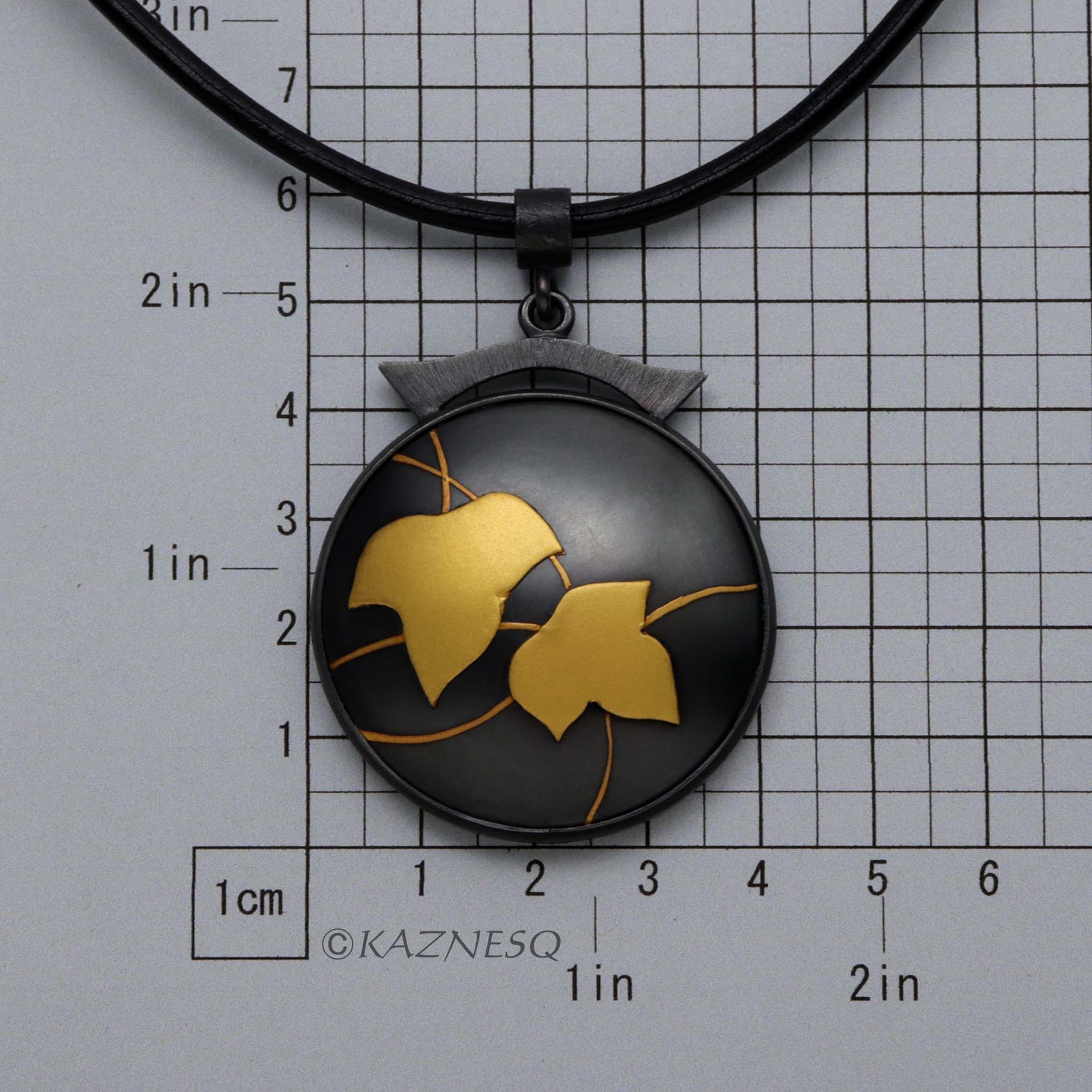 (C) KAZNESQ: Ivy Keum Boo circle pendant of oxidized silver