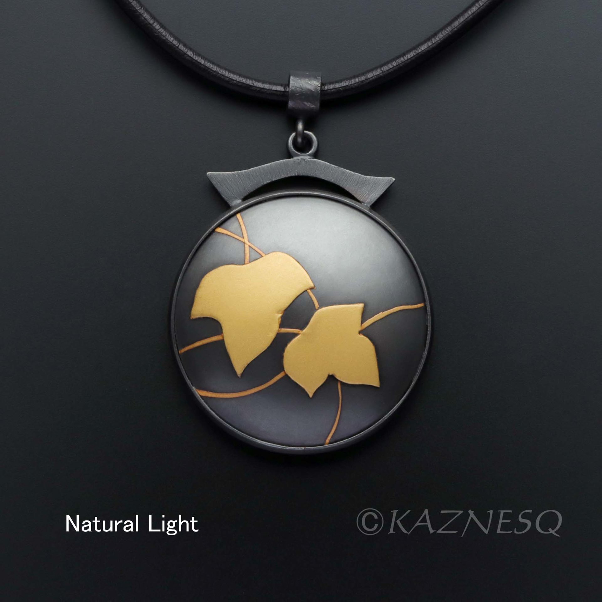 (C) KAZNESQ: Ivy Keum Boo circle pendant of oxidized silver