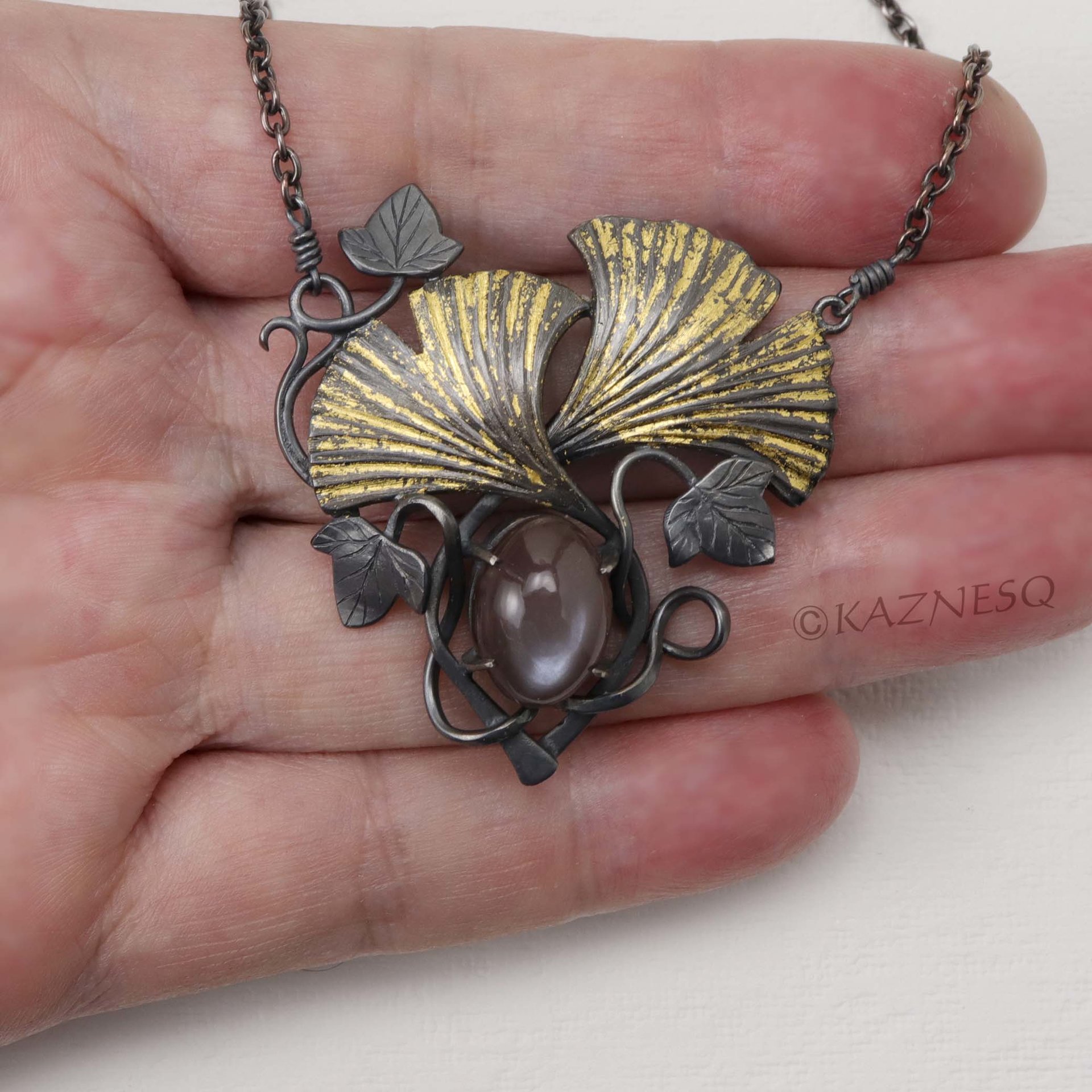 (C) KAZNESQ: Art Nouveau ginkgo necklace with brown moonstone and gold leaf