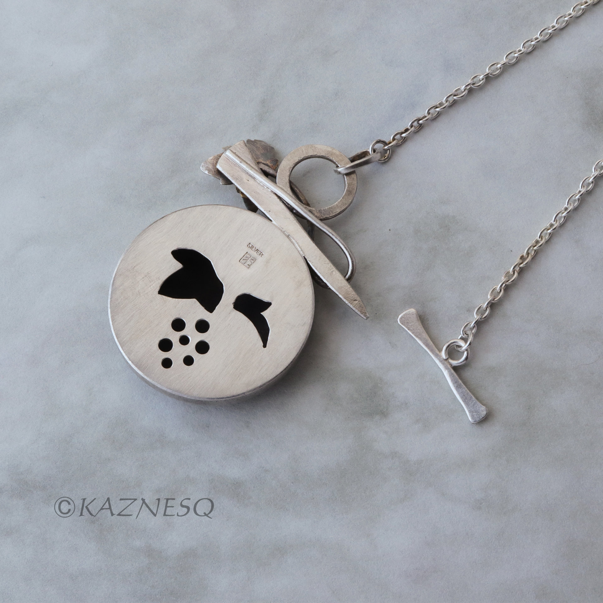(C) KAZNESQ: Wild grape Keum Boo copper and silver necklace.